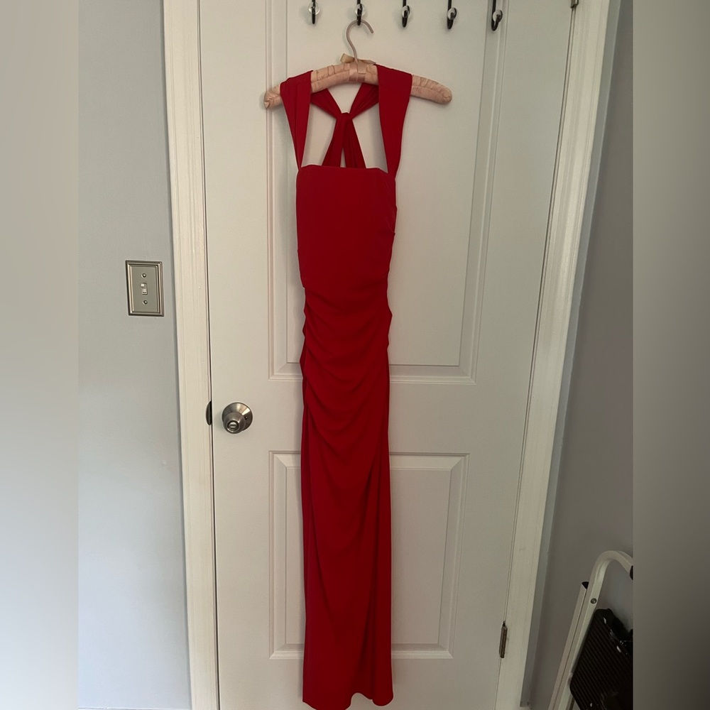 Vibrant red prom dress with side slit and halter neck